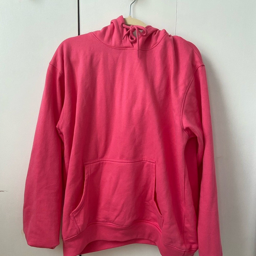 bright pink sweatshirt